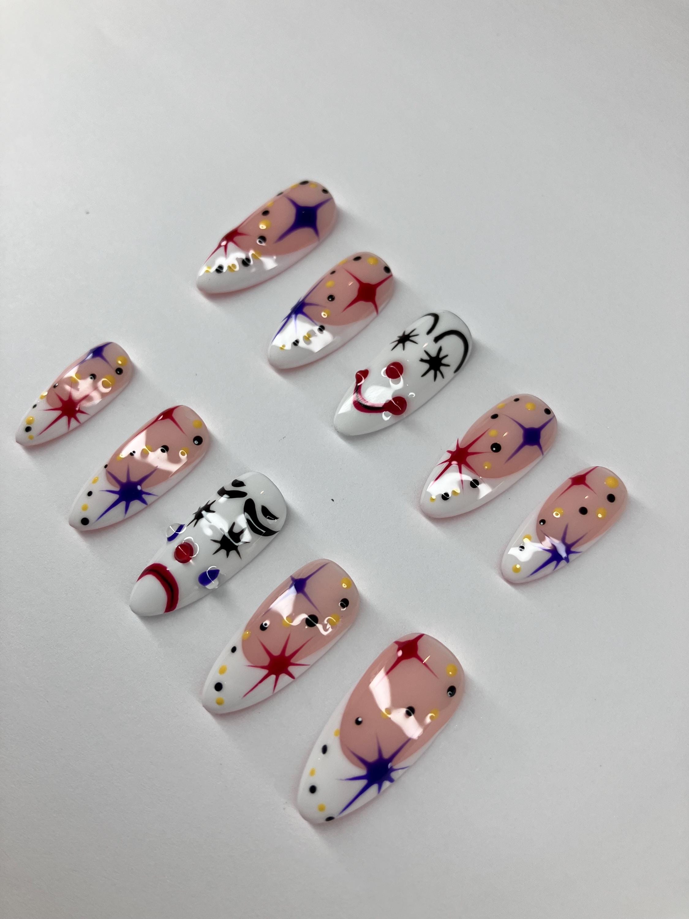 Clowning around press on nails with clown face design, application pack included.