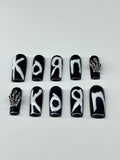 Monochrome KORN inspired press on nails with application pack