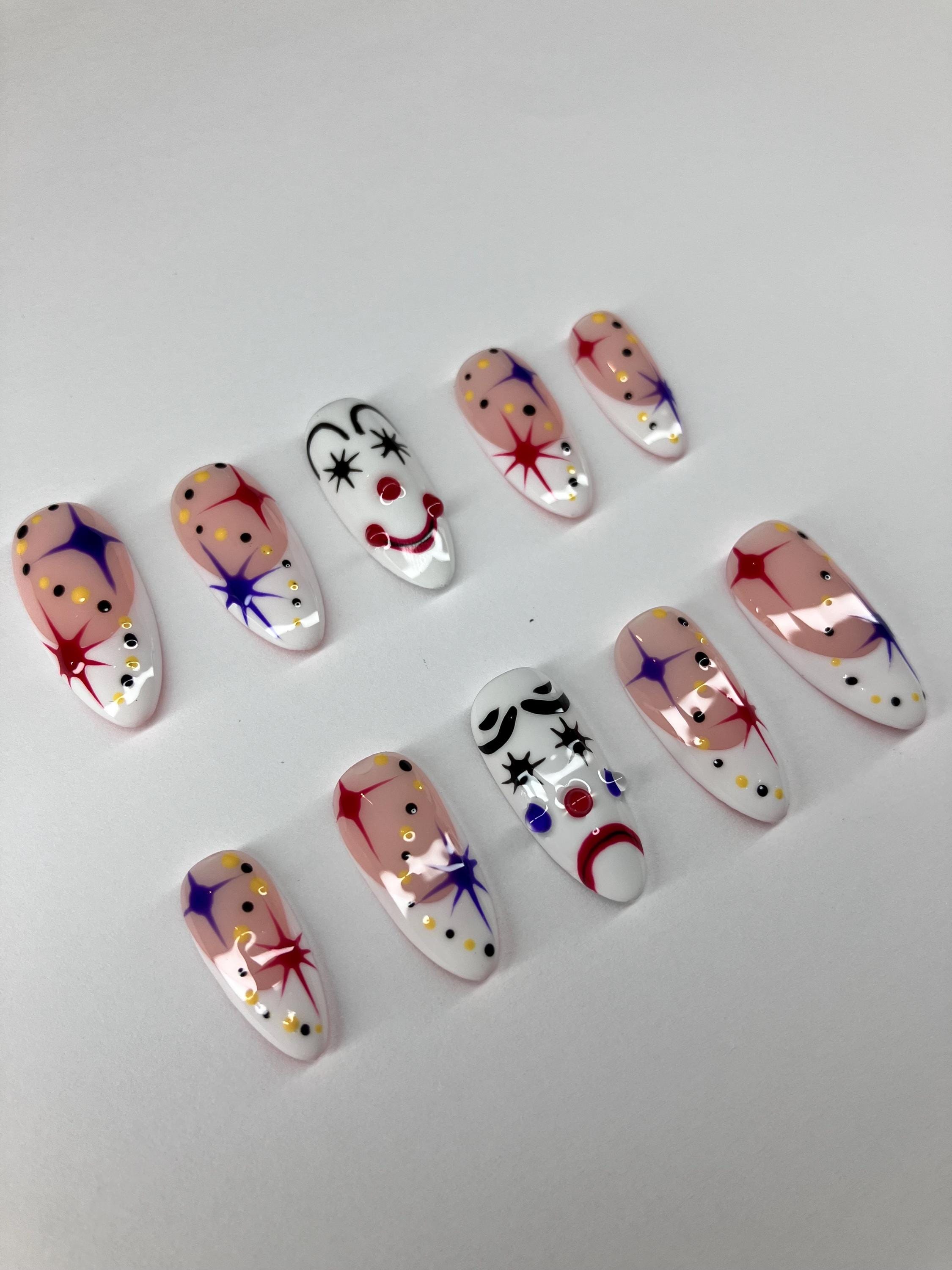 Clowning around press on nails with clown face design, application pack included.