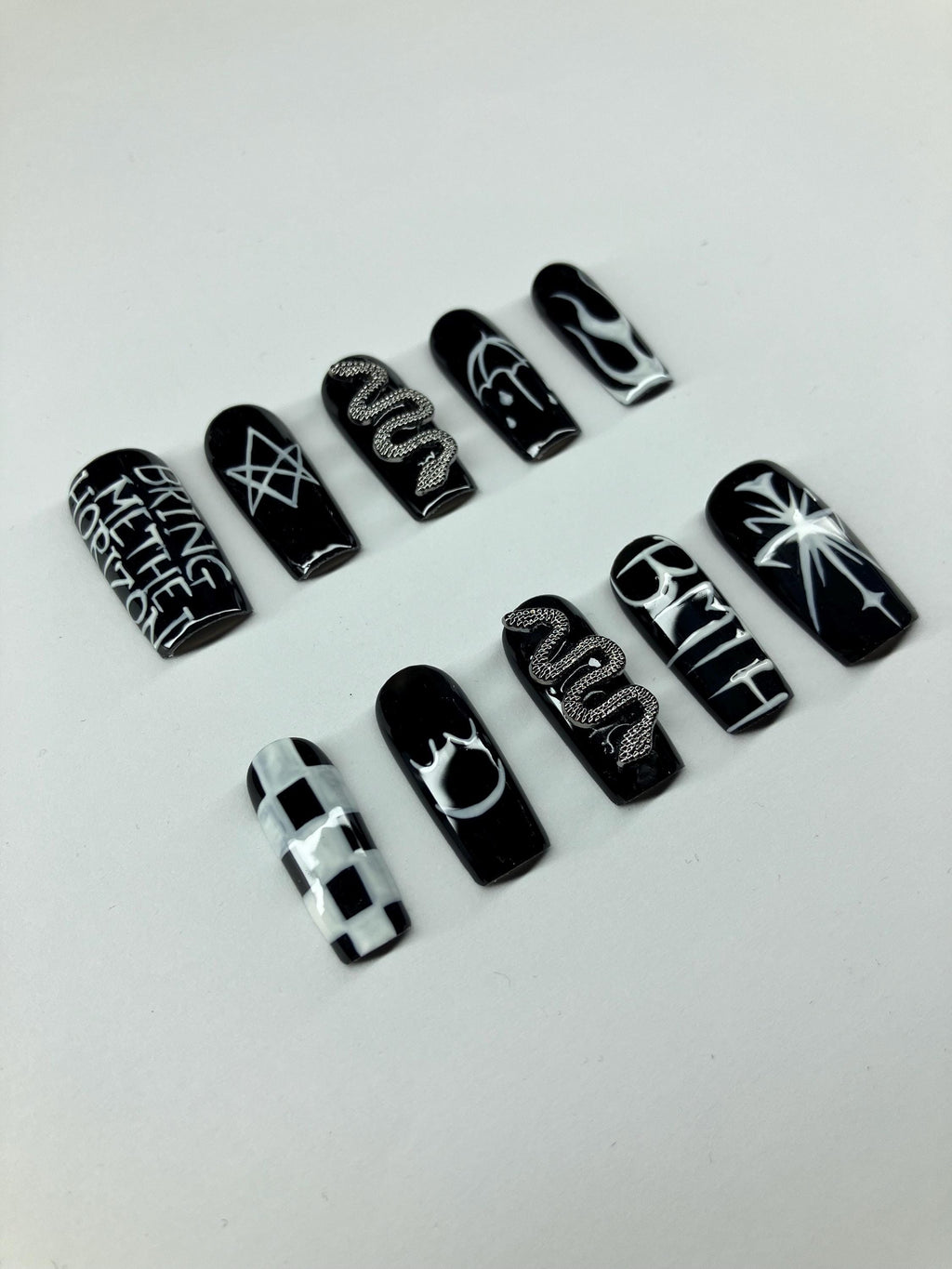 Black and white design press on nails with application pack included