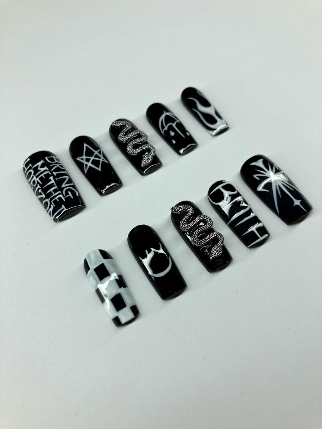 Black and white design press on nails with application pack included