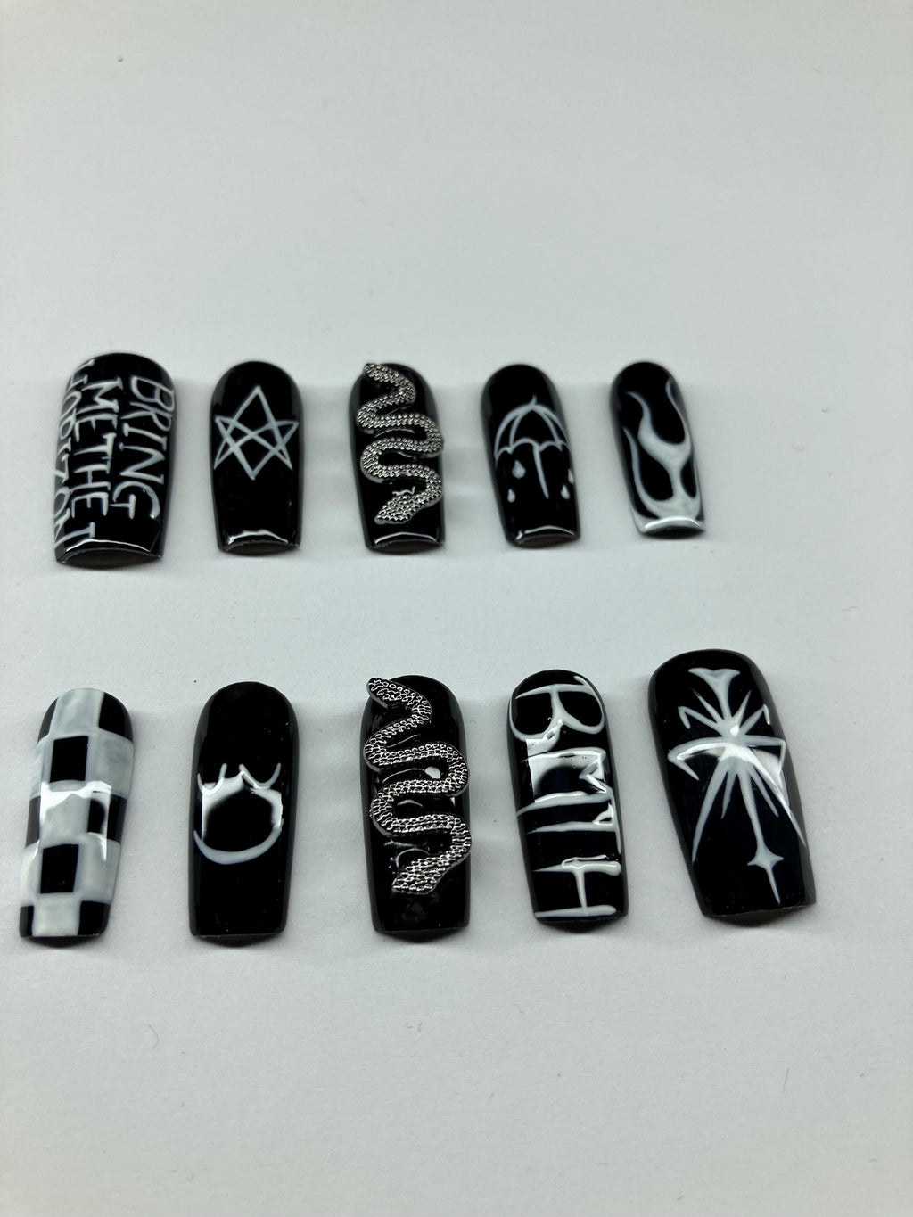 Black and white design press on nails with application pack included