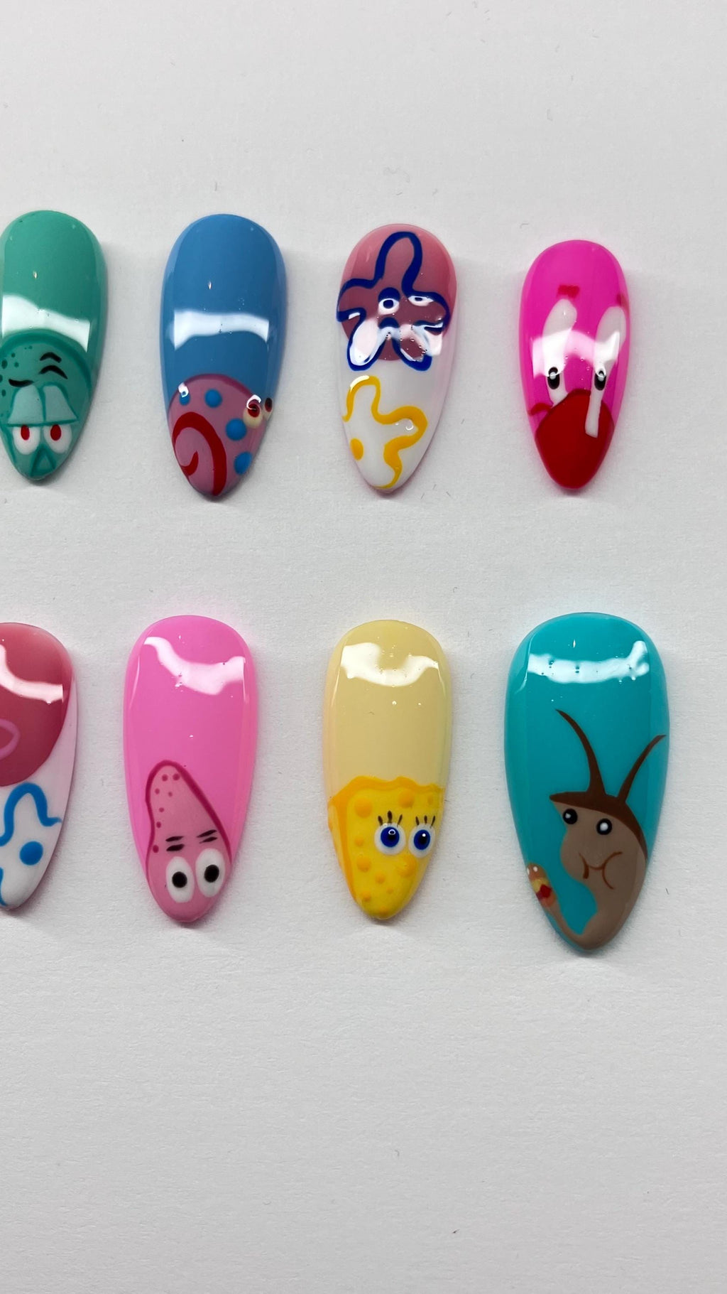 Bikini bottom inspired press on nails with detailed nail art, application pack included