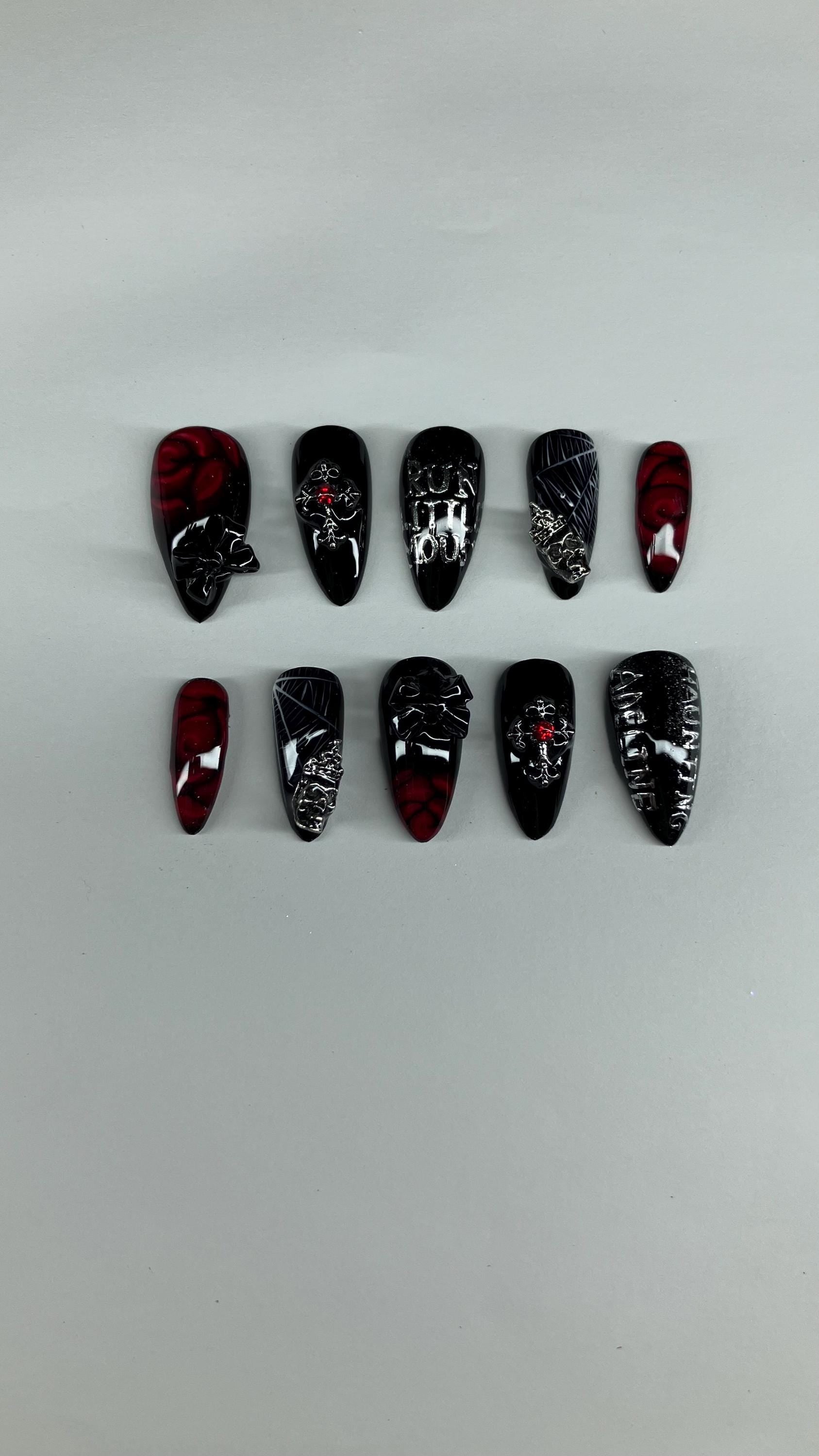 Gothic red and black spider and rose press on nails with application pack included.
