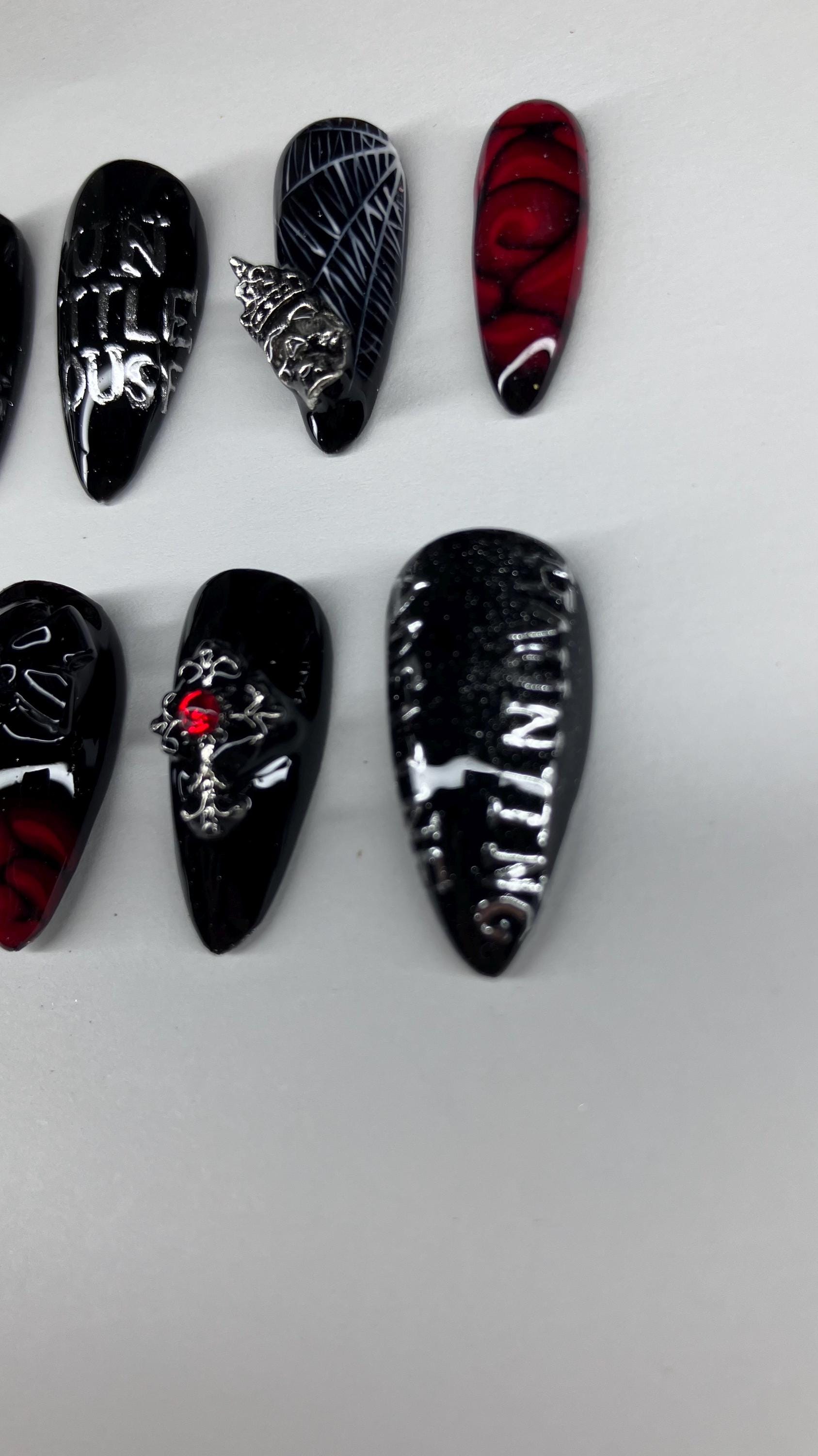 Gothic red and black spider and rose press on nails with application pack included.