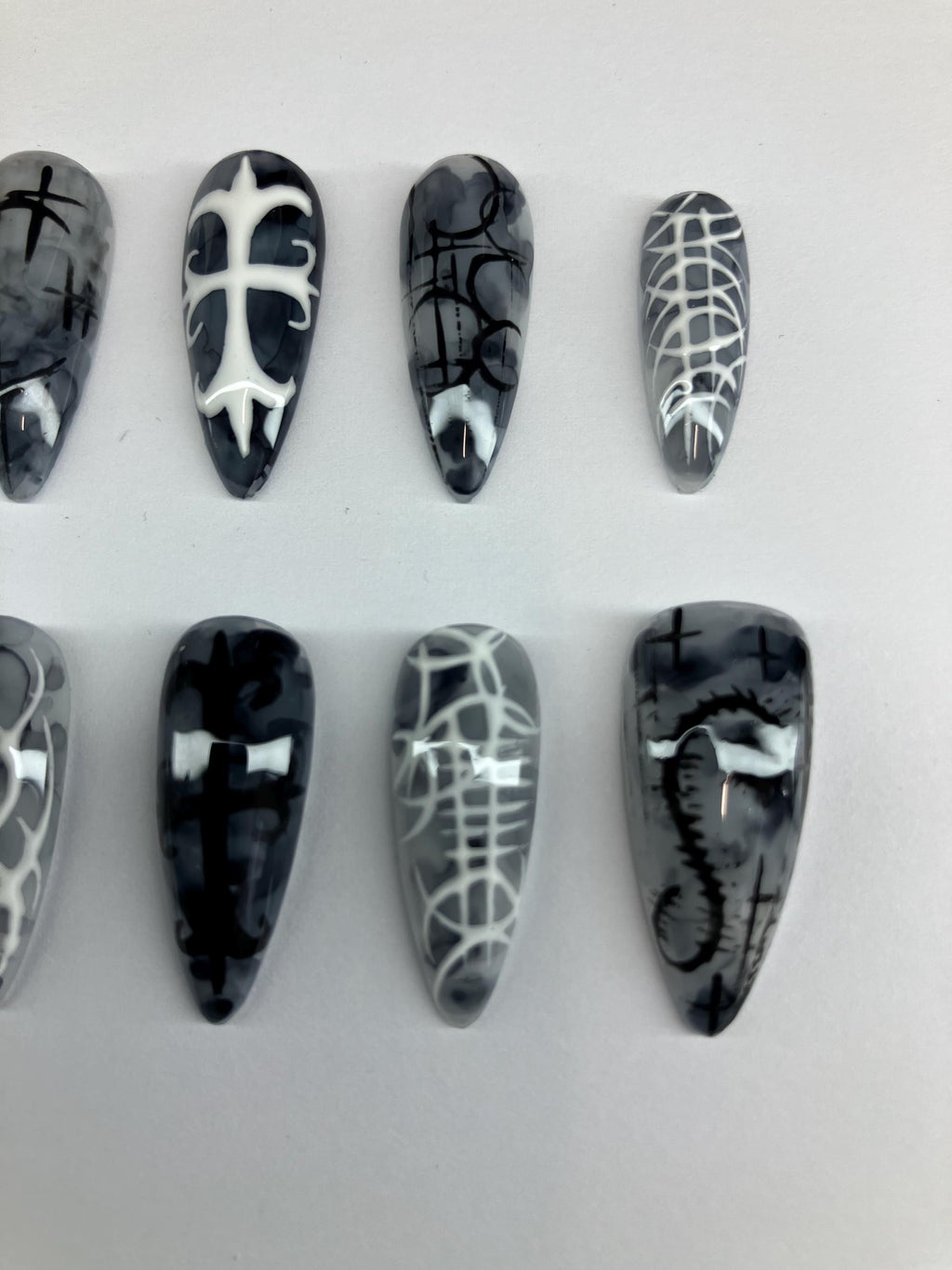 Gothic marble design press on nails, with intricate nail art. Application pack included.