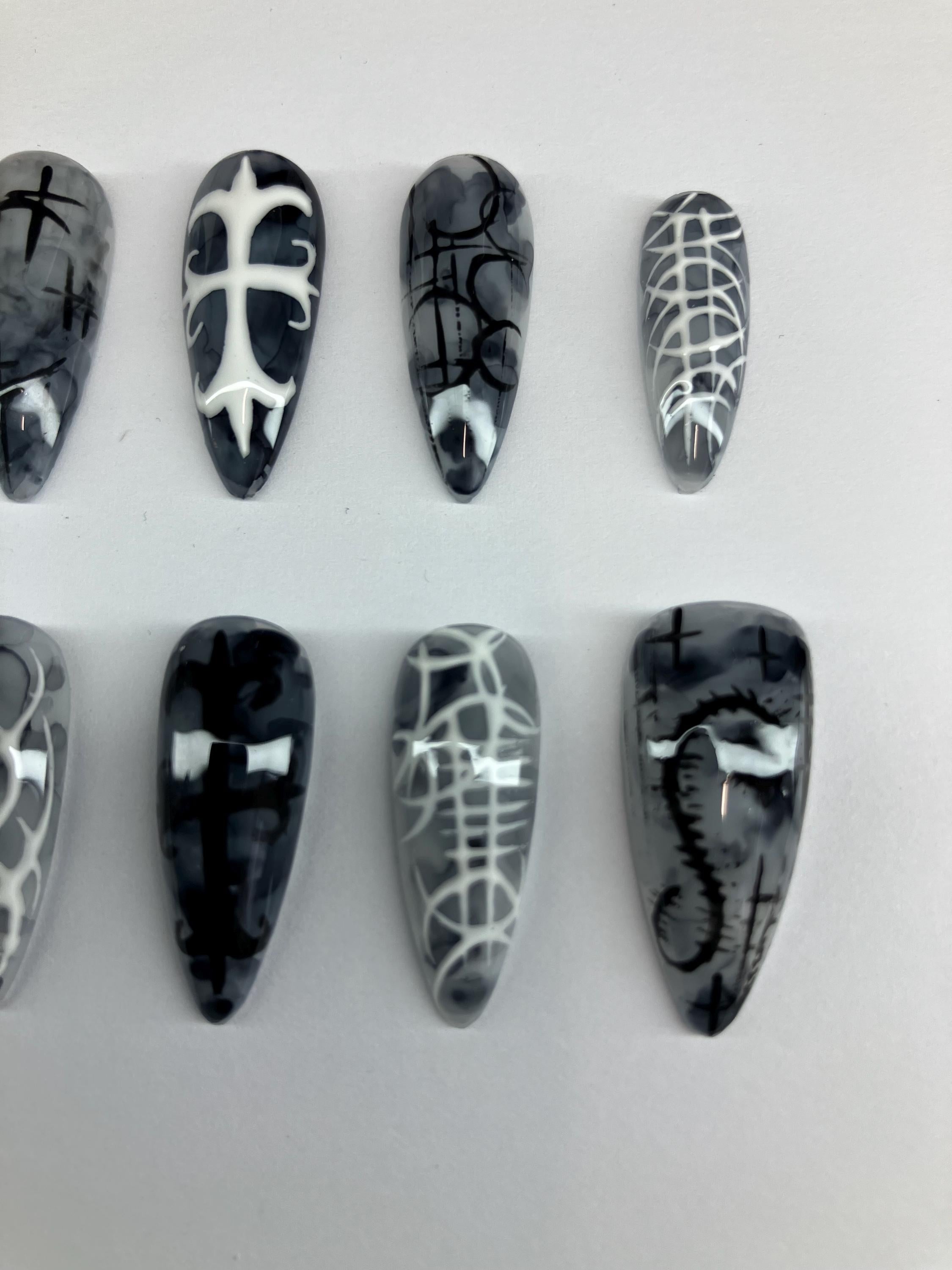 Gothic marble design press on nails, with intricate nail art. Application pack included.