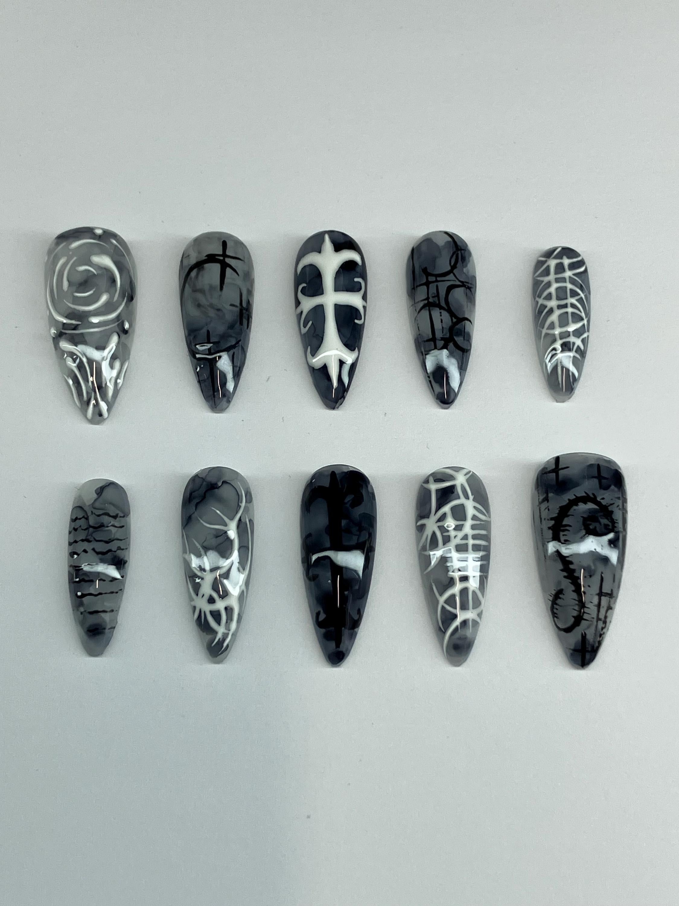 Gothic marble design press on nails, with intricate nail art. Application pack included.