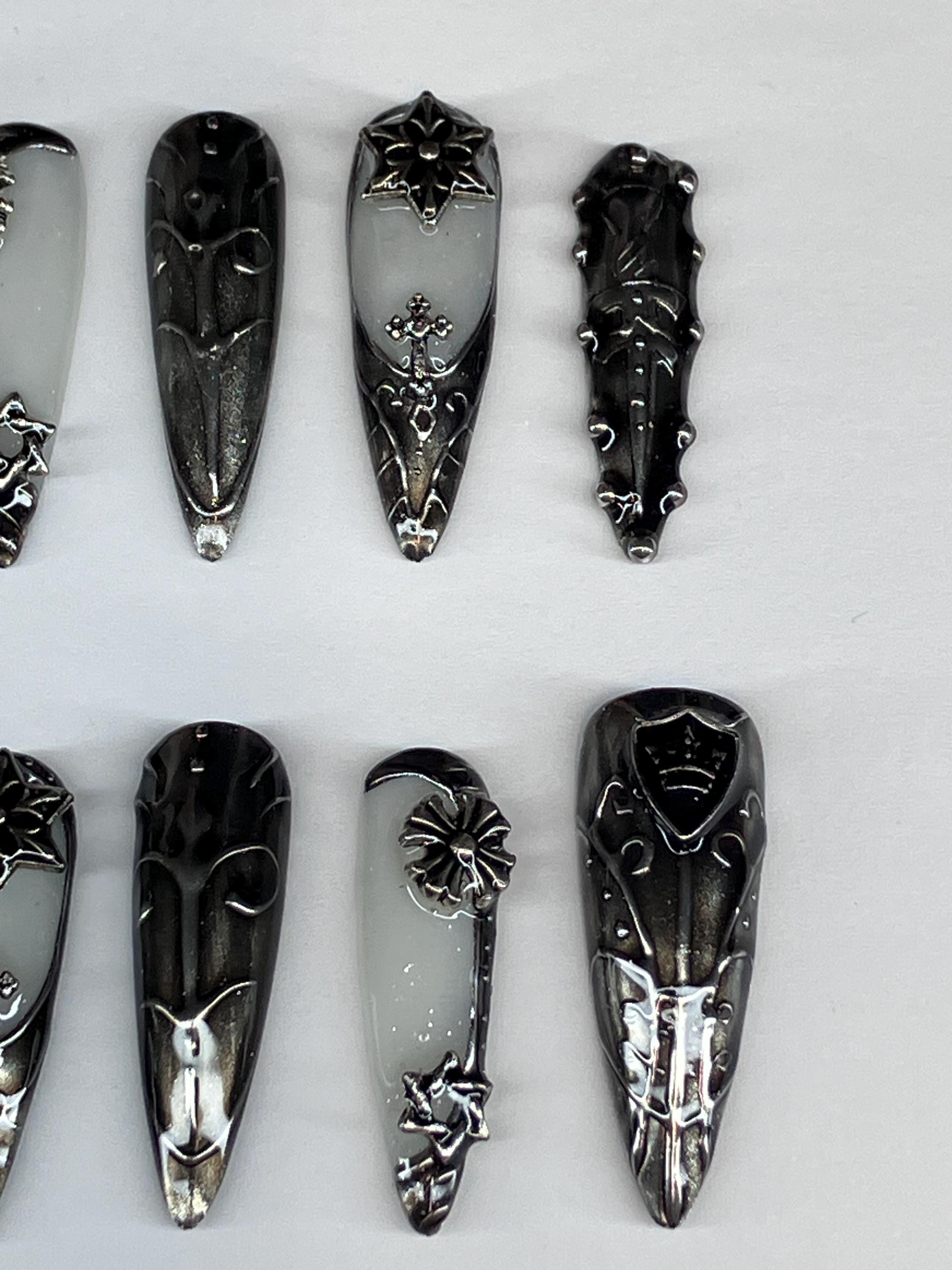 Medieval armour design press on nails featuring dark gothic designs, application pack included.