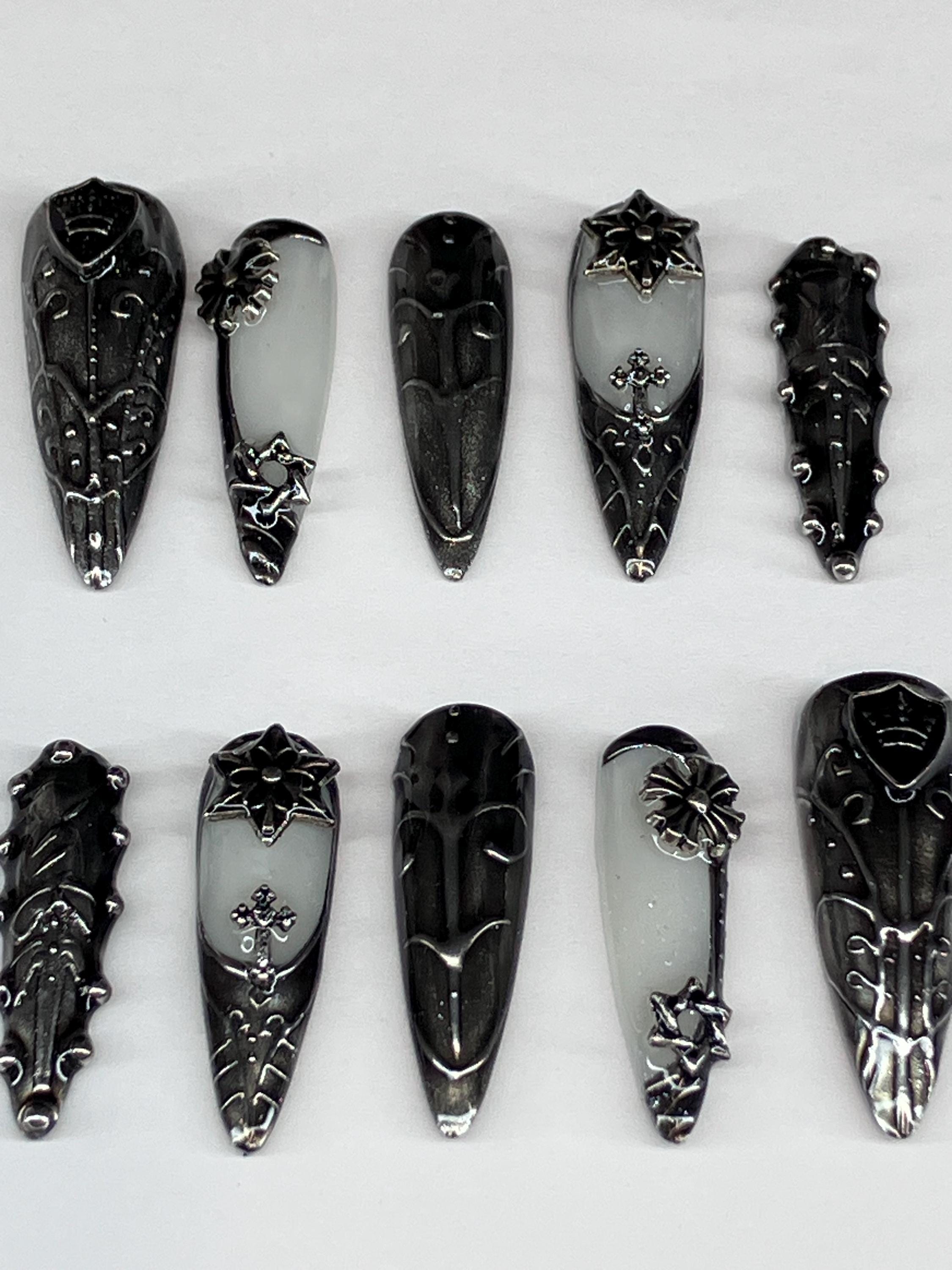 Medieval armour design press on nails featuring dark gothic designs, application pack included.