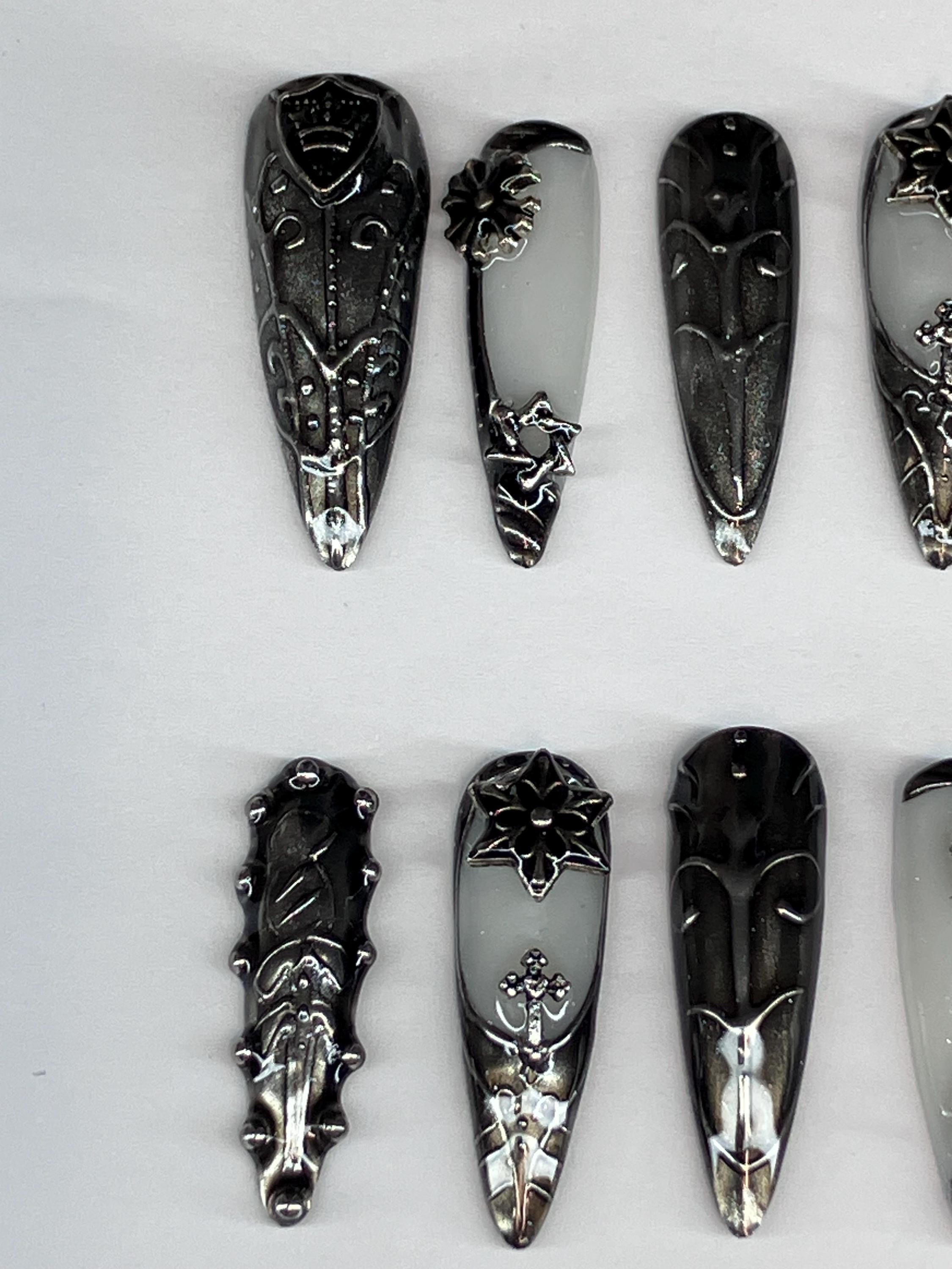 Medieval armour design press on nails featuring dark gothic designs, application pack included.