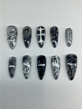 Gothic marble design press on nails, with intricate nail art. Application pack included.