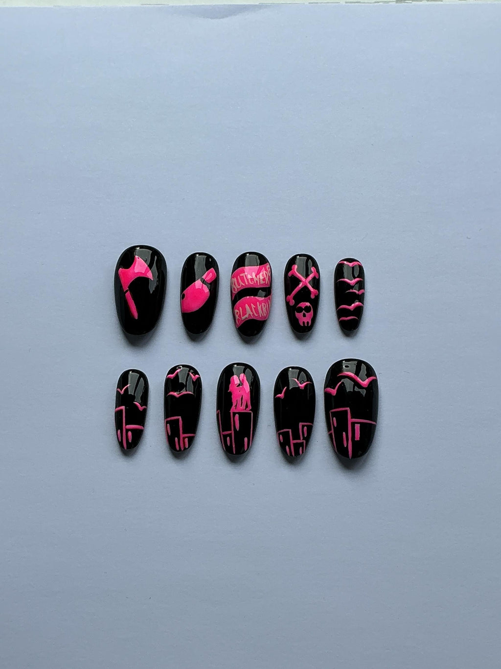 Blackbird neon pink design press on nails, application pack included