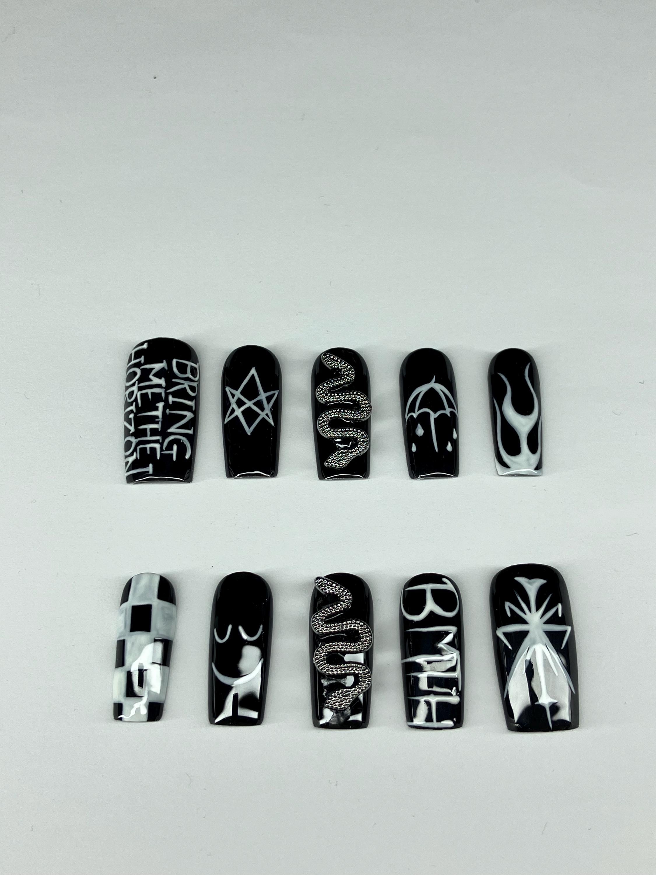 Black and white design press on nails with application pack included